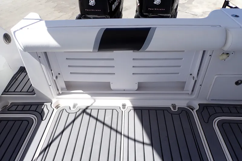 Slide: The Image of 2014 Pro-Line 32 Express boat deck with seating and Mercury FourStroke engines. - 48
