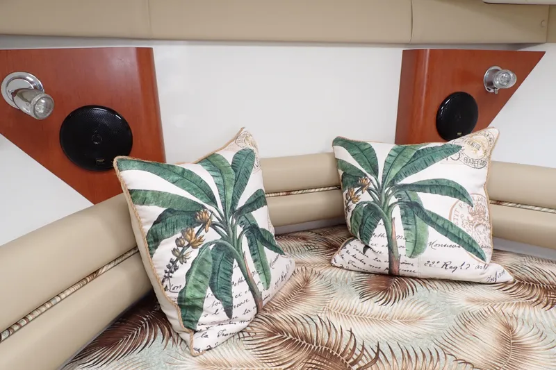 Slide: The Image of Cozy cabin interior of 2014 Pro-Line 32 Express with tropical-themed pillows. - 76