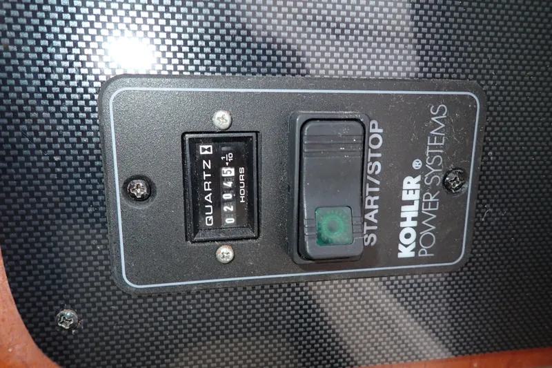 Slide: The Image of Kohler Power Systems control panel on 2014 Pro-Line 32 Express boat. - 99