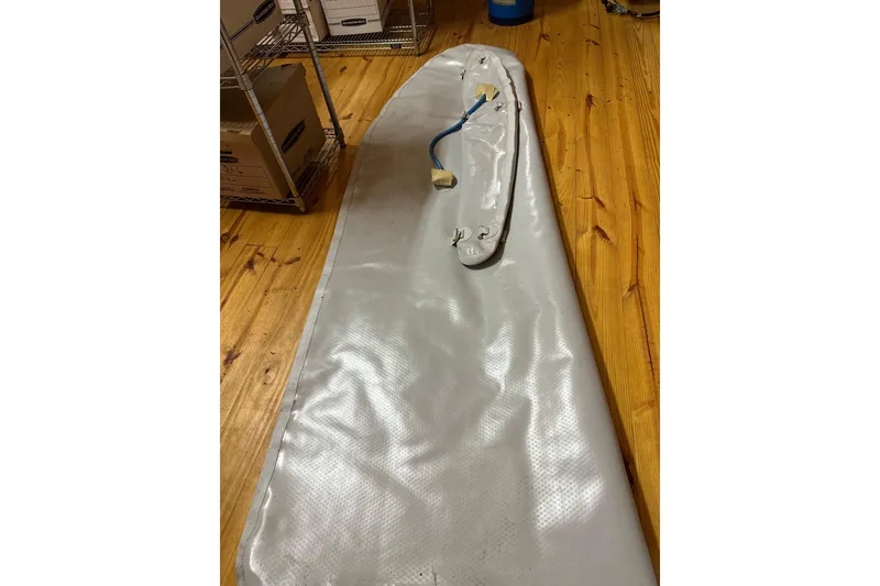 Slide: The Image of Inflatable boat keel on wooden floor, Catalina 400 MkII, 2002 model. - 15