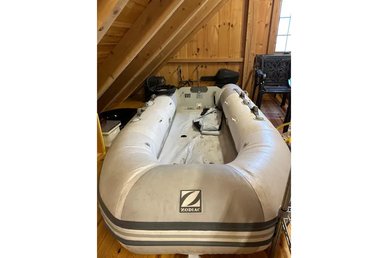 Slide: The Image of Inflatable Zodiac boat stored indoors, wooden interior, Catalina 400 MkII, 2002 model. - 16
