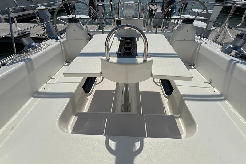 Slide: The Image of Cockpit of 2002 Catalina 400 MkII sailboat with steering wheel and seating area. - 20