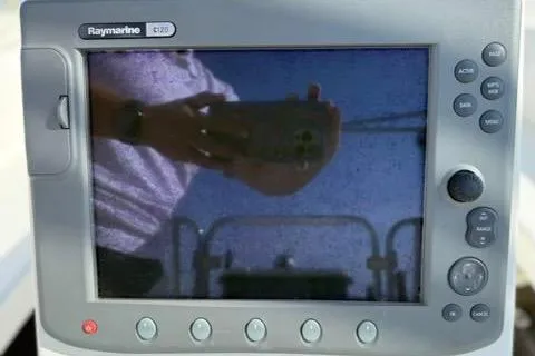 Slide: The Image of Raymarine E120 display on a 2002 Catalina 400 MkII sailboat, showing a reflection. - 27