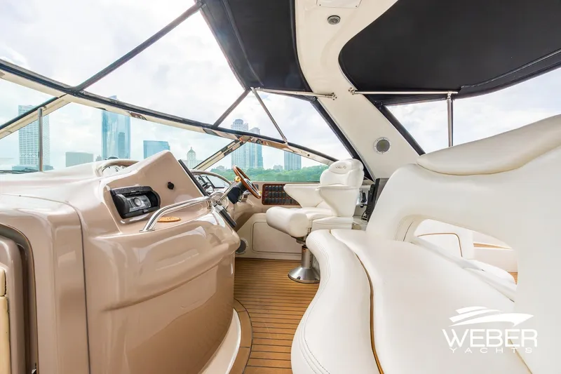 Slide: The Image of Luxurious interior of 2000 Sea Ray Sundancer 460 yacht with city skyline view. - 14
