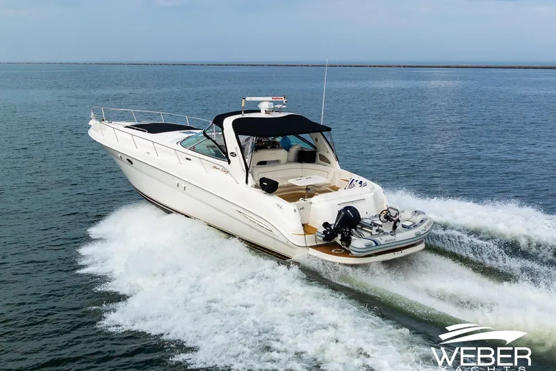 Slide: The Image of Sea Ray Sundancer 460 yacht cruising on open water, 2000 model. - 40