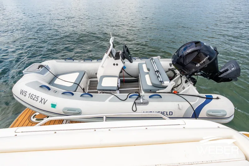 Slide: The Image of Inflatable boat with Tohatsu motor on Sea Ray Sundancer 460 yacht, 2000 model. - 42