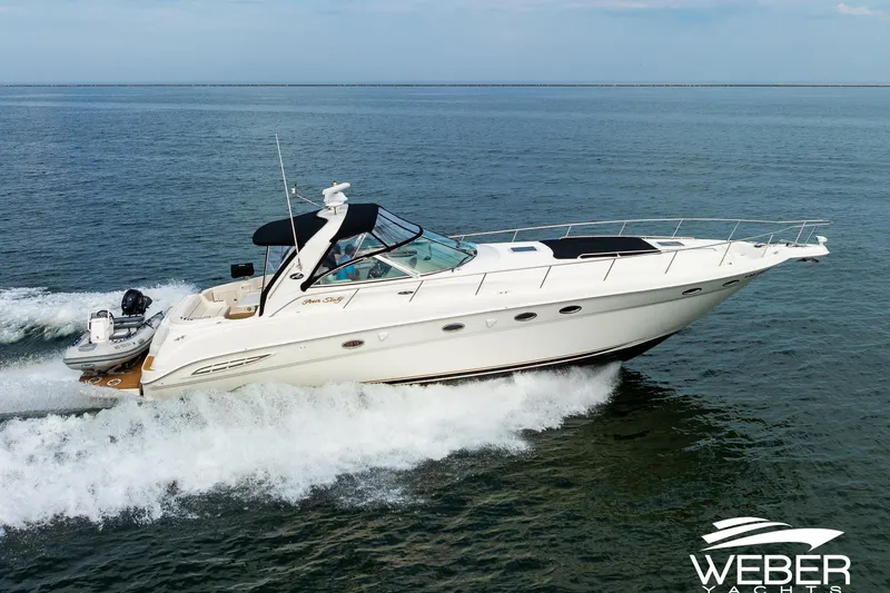 Slide: The Image of Sea Ray Sundancer 460 yacht cruising on open water, 2000 model. - 1