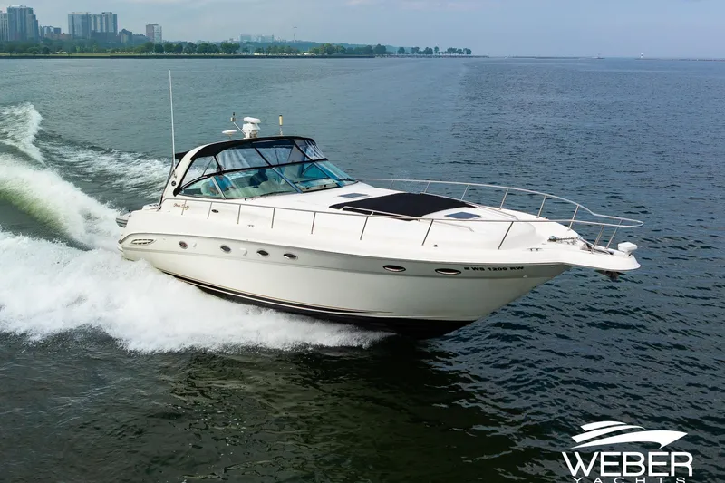 Slide: The Image of Sea Ray Sundancer 460 yacht cruising on open water, 2000 model. - 3