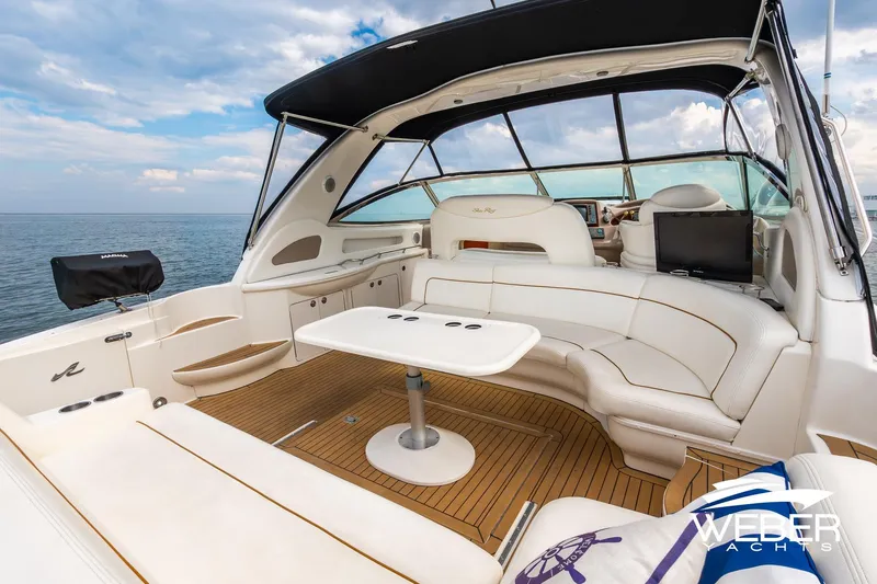 Slide: The Image of Luxurious 2000 Sea Ray Sundancer 460 yacht interior with elegant seating and ocean view. - 9