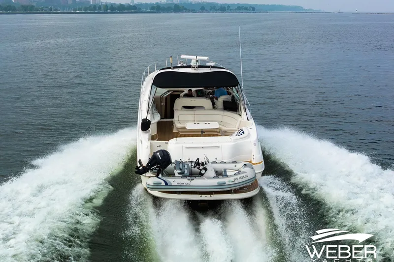 Slide: The Image of Sea Ray Sundancer 460 yacht cruising on open water, rear view, 2000 model. - 41