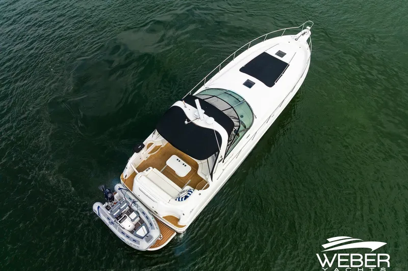 Slide: The Image of Aerial view of 2000 Sea Ray Sundancer 460 yacht on open water. - 39