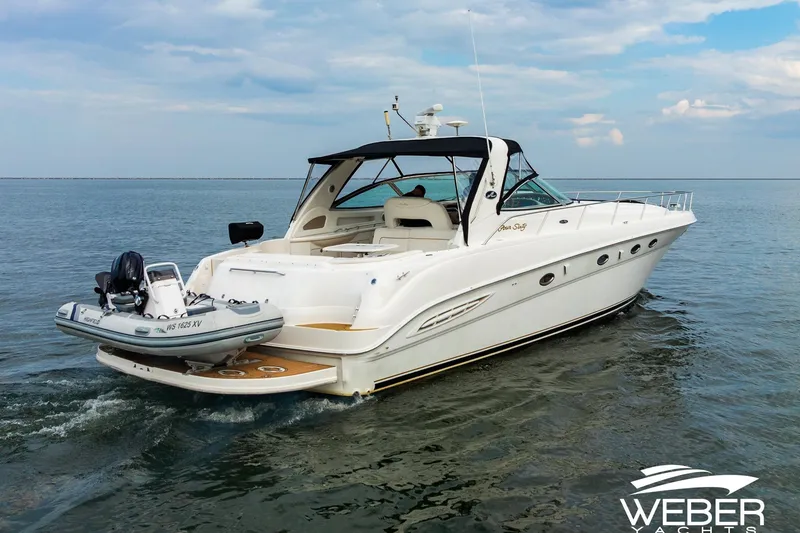 Slide: The Image of Sea Ray Sundancer 460 yacht cruising on open water, 2000 model. - 32