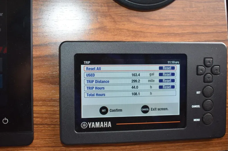 Slide: The Image of Yamaha display on 2021 Ranger Tugs R-27 showing trip data and settings. - 37