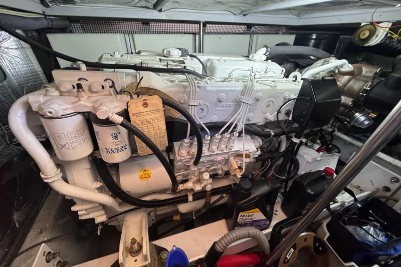 Slide: The Image of Engine room of a 2003 Silverton 410 Sport Bridge with Volvo Penta components. - 42