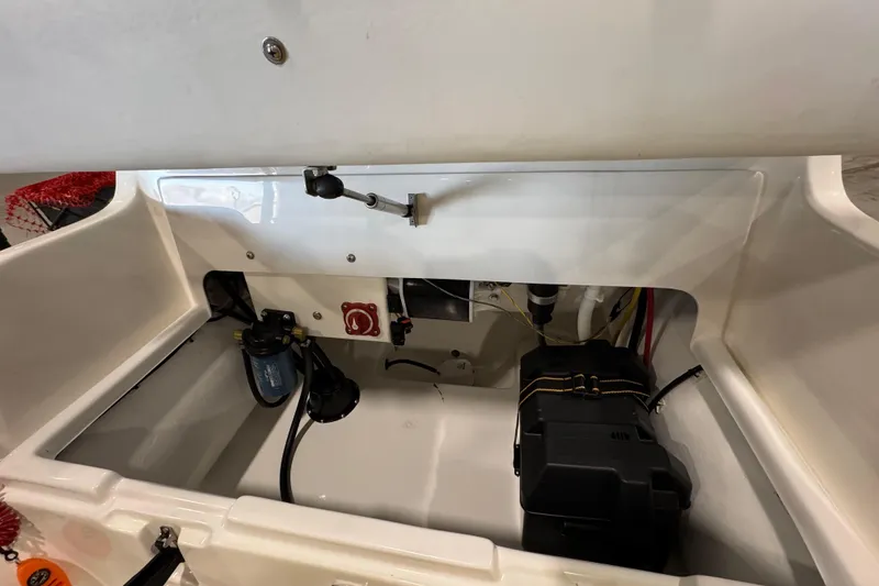 Slide: The Image of 2018 AB Inflatables Nautilus 12 DLX boat interior compartment with equipment and wiring. - 15