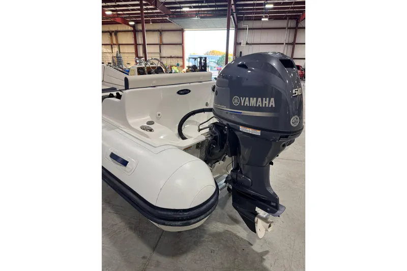 Slide: The Image of 2018 AB Inflatables Nautilus 12 DLX with Yamaha 50 outboard motor in warehouse. - 6