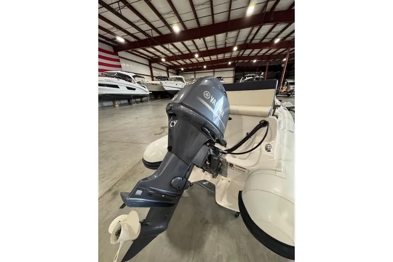 Slide: The Image of 2018 AB Inflatables Nautilus 12 DLX with Yamaha outboard motor in a showroom. - 7