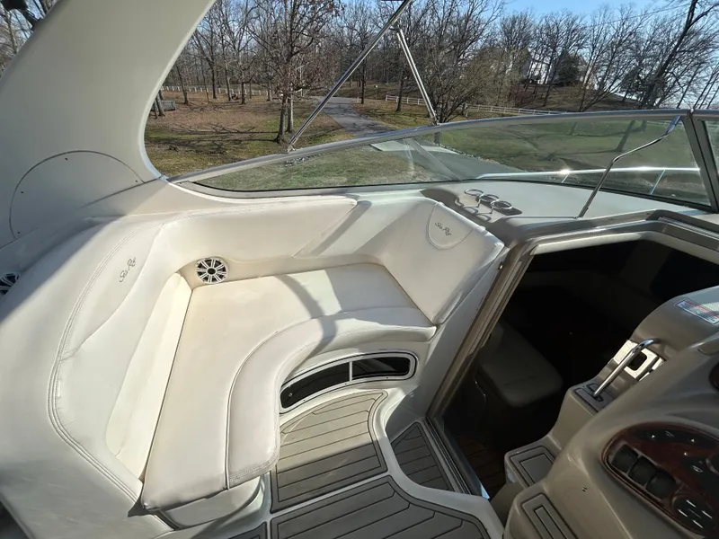 Slide: The Image of Interior of a 2005 Sea Ray Sundancer 280 with white seating. - 16