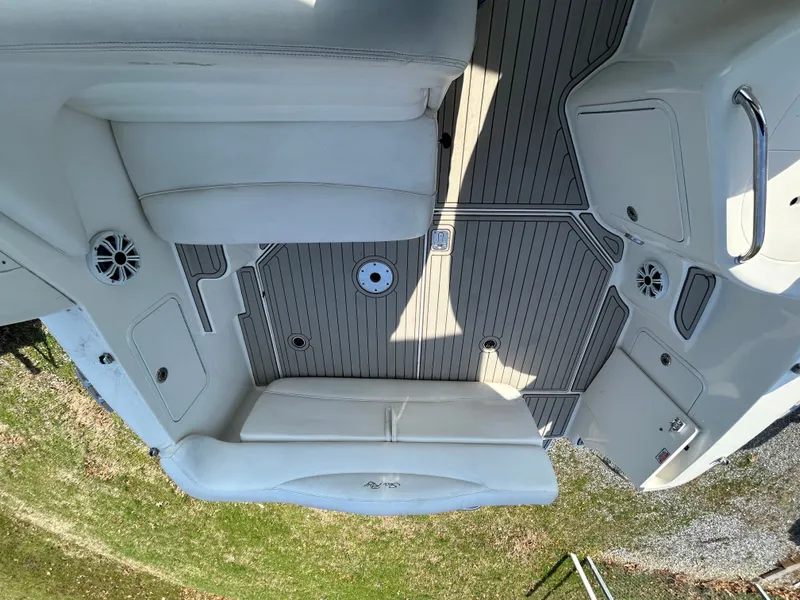 Slide: The Image of Interior of a 2005 Sea Ray Sundancer 280 boat with seating area. - 19