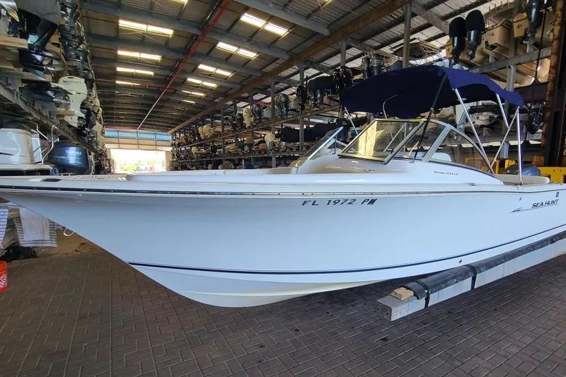 Slide: The Image of 2013 Sea Hunt Escape 234 LE boat in storage facility. - 2