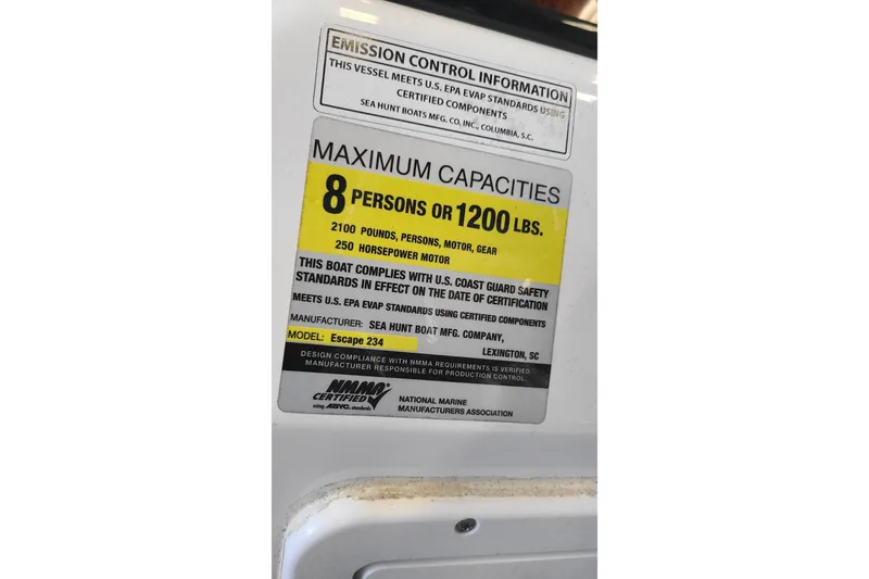Slide: The Image of 2013 Sea Hunt Escape 234 LE capacity label, 8 persons or 1200 lbs, 250 horsepower. - 28