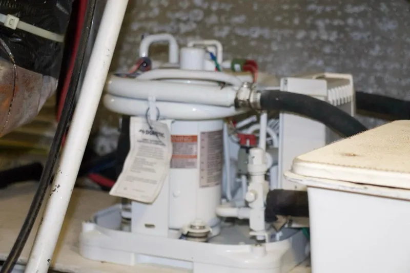 Slide: The Image of Engine room equipment in a 2002 McKinna 57 Pilothouse yacht. - 35