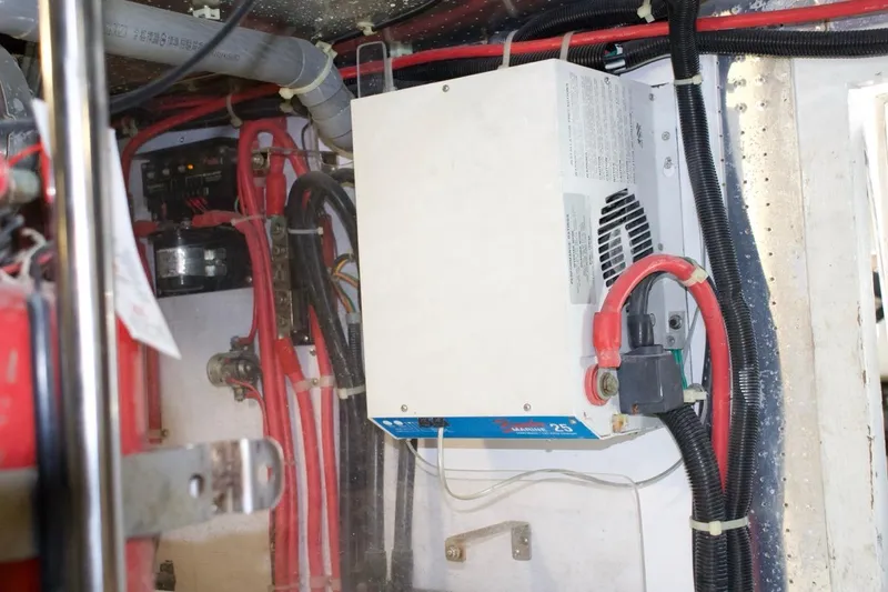 Slide: The Image of Engine room wiring and equipment in a 2002 McKinna 57 Pilothouse yacht. - 37