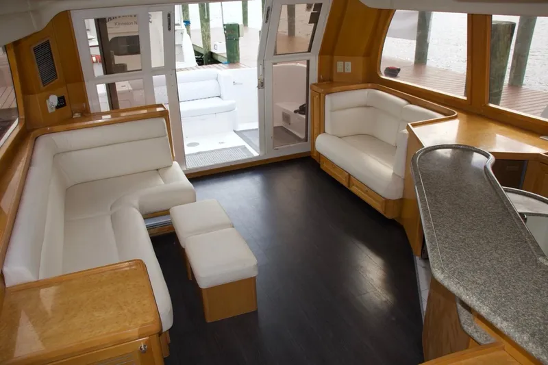 Slide: The Image of Luxurious interior of 2002 McKinna 57 Pilothouse yacht with elegant seating and modern design. - 44