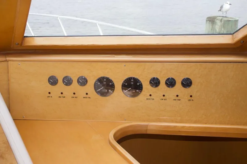 Slide: The Image of Control panel of a 2002 McKinna 57 Pilothouse yacht with gauges and indicators. - 47