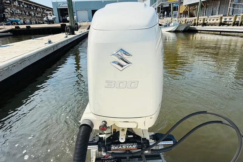 Slide: The Image of 2018 Sea Born LX24 Center Console with Suzuki 300 outboard engine at dock. - 15