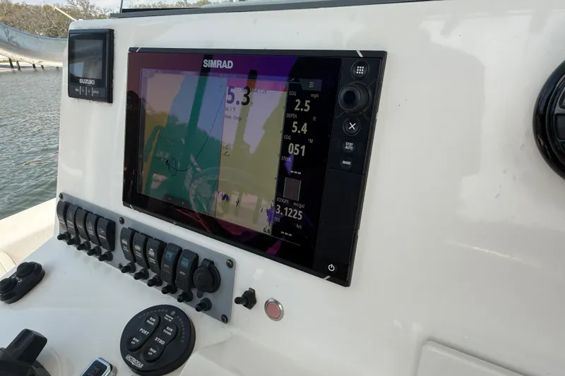 Slide: The Image of 2018 Sea Born LX24 Center Console with Simrad navigation display. - 16