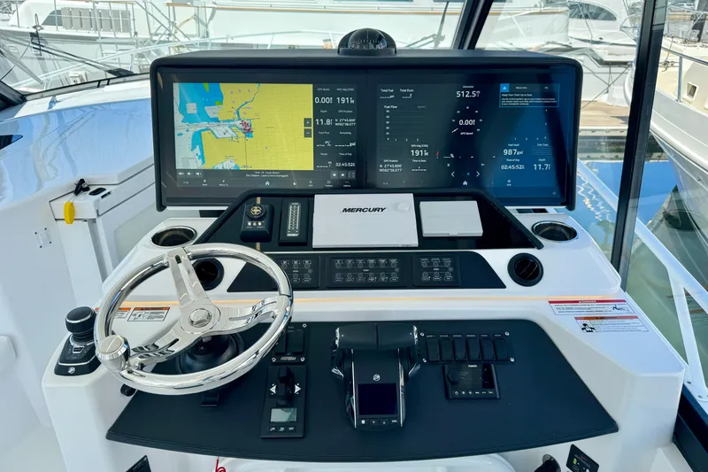 Slide: The Image of Helm of 2025 Intrepid 50 Evolution with advanced navigation display and controls. - 16