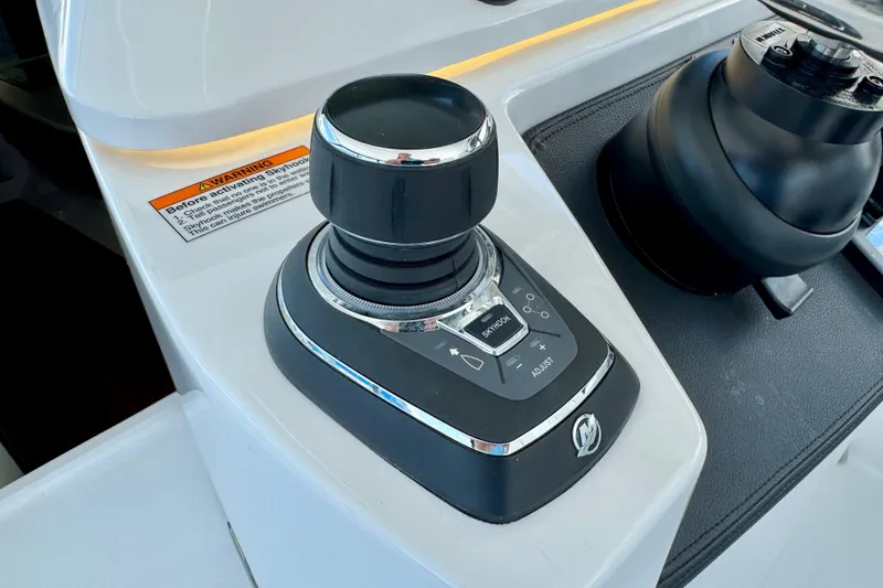 Slide: The Image of Joystick control on 2025 Intrepid 50 Evolution yacht dashboard. - 17
