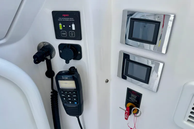 Slide: The Image of Control panel of 2025 Intrepid 50 Evolution boat with communication device and touchscreens. - 18
