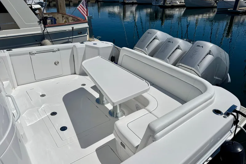 Slide: The Image of Luxurious 2025 Intrepid 50 Evolution yacht with spacious seating and powerful engines. - 2