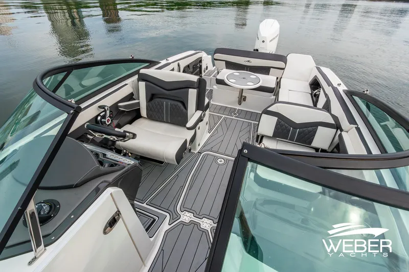 Slide: The Image of 2023 Monterey 255SS Super Sport boat interior with sleek seating and modern design. - 34