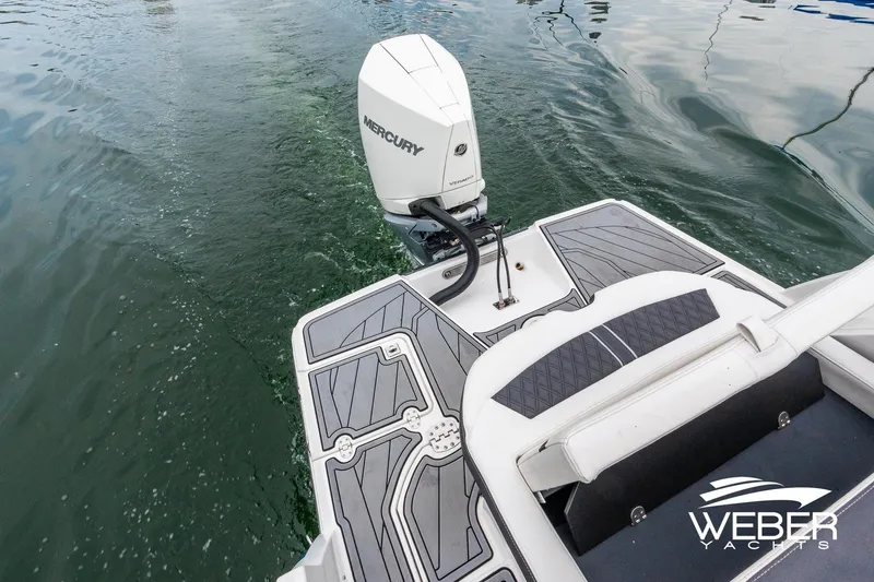 Slide: The Image of 2023 Monterey 255SS Super Sport boat with Mercury outboard engine on water. - 16