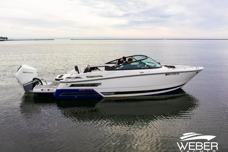 Slide: The Image of 2023 Monterey 255SS Super Sport boat on calm water, side view. - 5