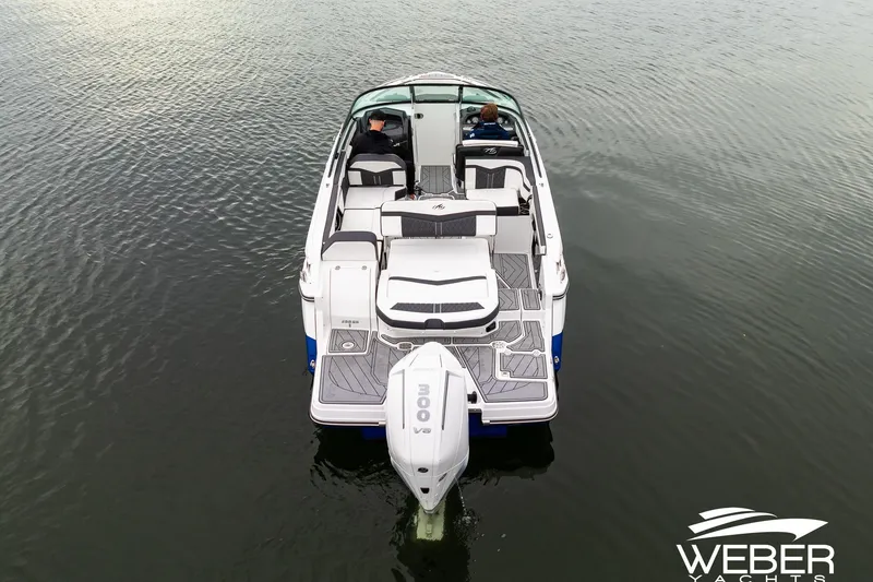Slide: The Image of 2023 Monterey 255SS Super Sport boat on calm water, aerial view. - 9