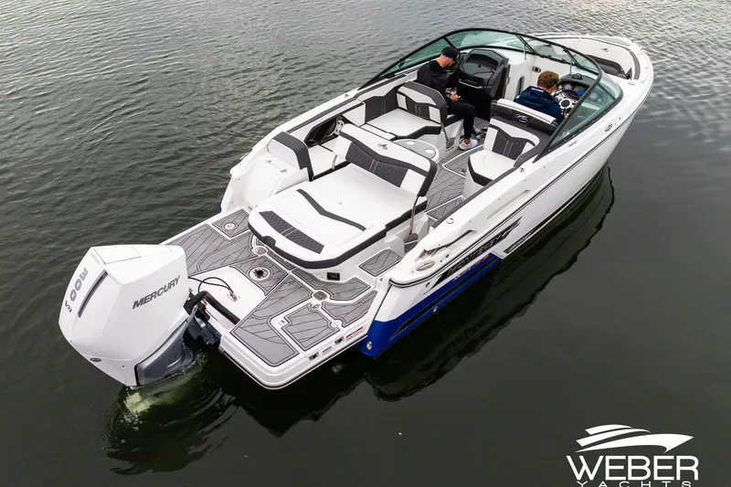 Slide: The Image of 2023 Monterey 255SS Super Sport boat on water, featuring Mercury engine and spacious seating. - 12