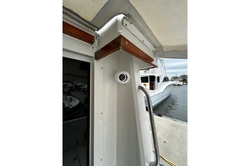 Slide: The Image of 2001 Sabre 34 boat with security camera, docked at marina. - 20