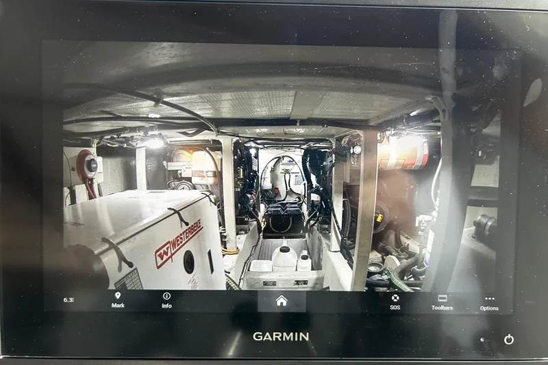 Slide: The Image of Engine room of a 2001 Sabre 34 boat with Westerbeke generator. - 21