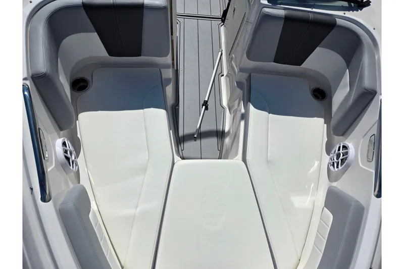 Slide: The Image of 2024 Chaparral 21 SSi boat interior with gray and white seating. - 12