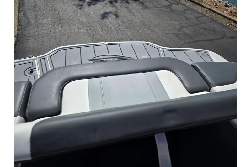 Slide: The Image of 2024 Chaparral 21 SSi boat interior, featuring sleek seating and modern design elements. - 19