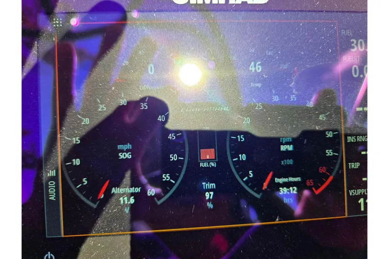 Slide: The Image of Dashboard of 2024 Chaparral 21 SSi boat displaying speed, RPM, and fuel levels. - 22