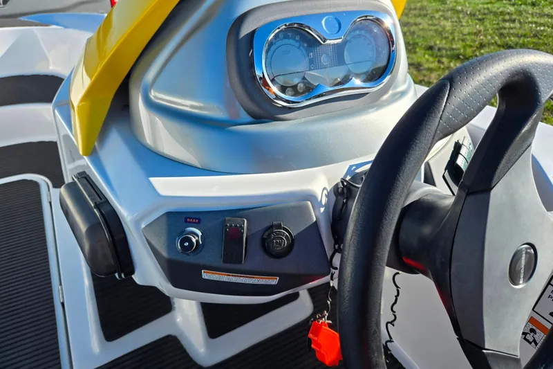 Slide: The Image of 2008 Sea-Doo 150 Speedster dashboard with steering wheel and control panel. - 13