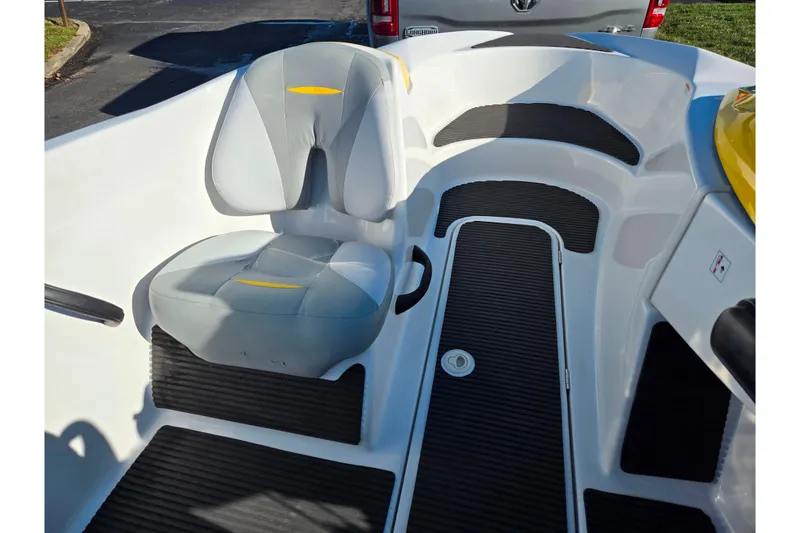 Slide: The Image of 2008 Sea-Doo 150 Speedster interior with gray seat and black flooring. - 14