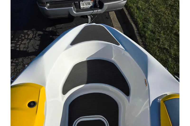 Slide: The Image of 2008 Sea-Doo 150 Speedster boat bow, featuring sleek design and textured flooring. - 18