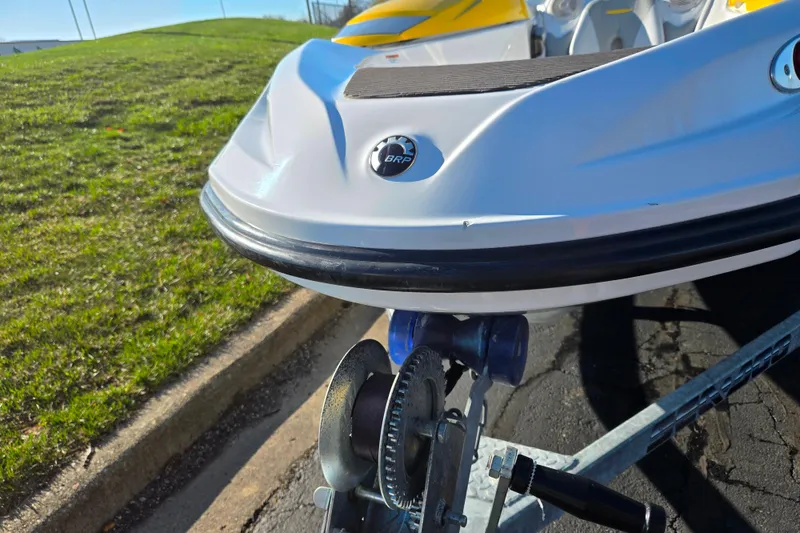 Slide: The Image of 2008 Sea-Doo 150 Speedster boat on trailer, close-up of bow and winch. - 7