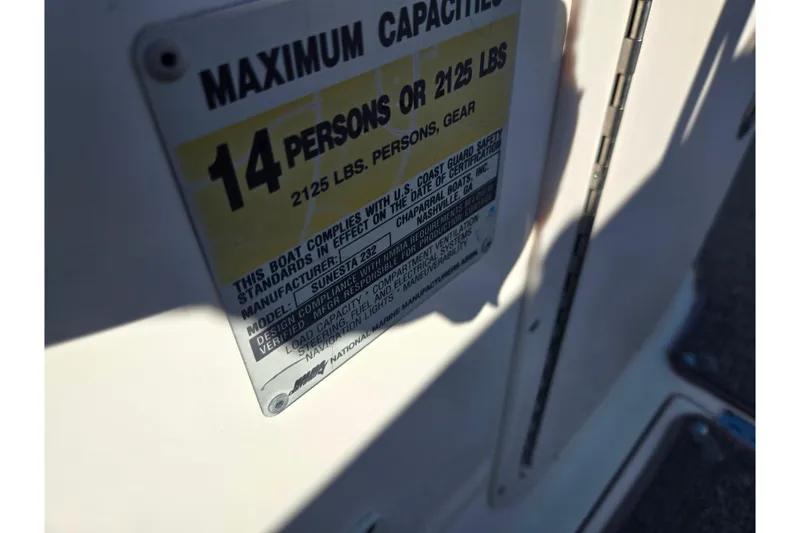 Slide: The Image of Capacity label on 2005 Chaparral Sunesta 232, indicating 14 persons or 2125 lbs. - 14